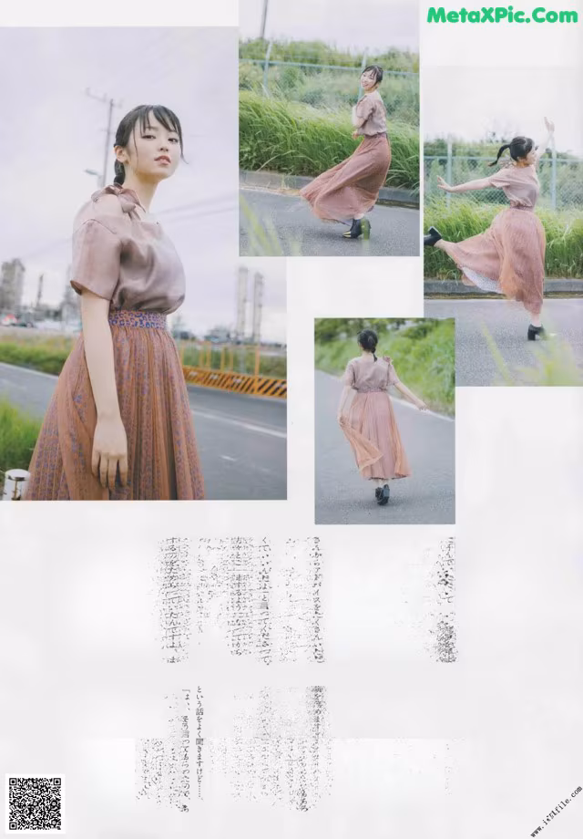 A woman in a pink dress is walking down the street.
