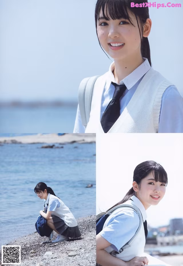 A young woman in a school uniform posing for a picture.